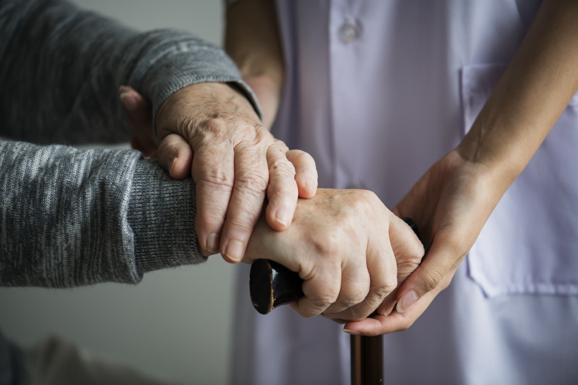 A nurse caring for a resident